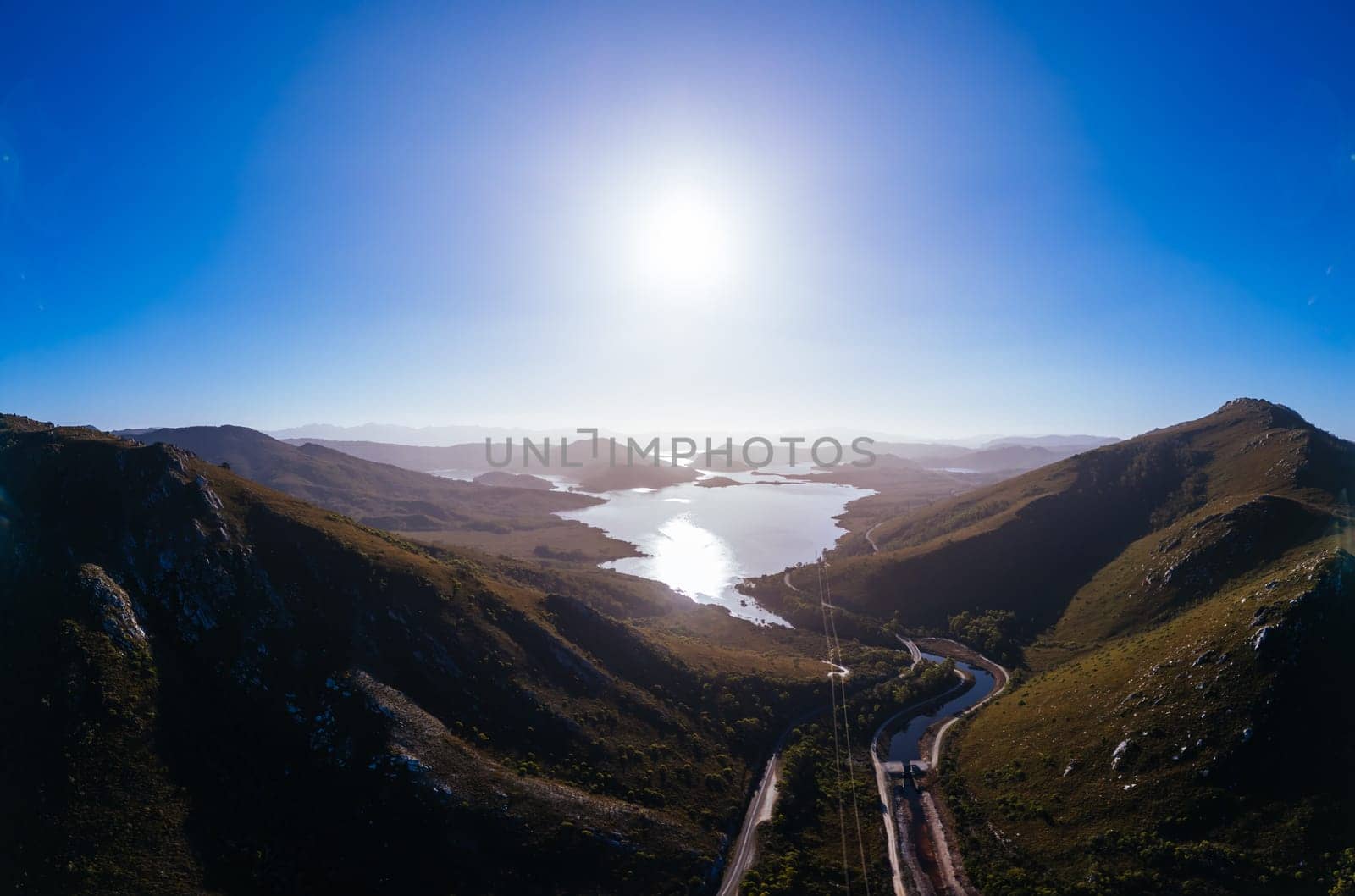 Aerial landscape of Lake Pedder on a hot summer's afternoon in Southwest National Park, Tasmania, Australia