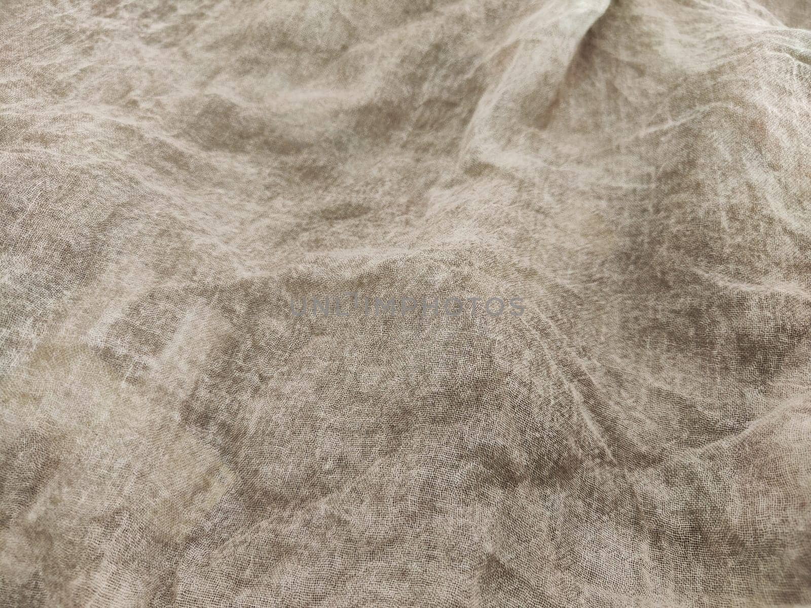 This soft beige linen has a delicate texture, perfect for upholstery, quilting, or other creative projects that require a tactile quality.