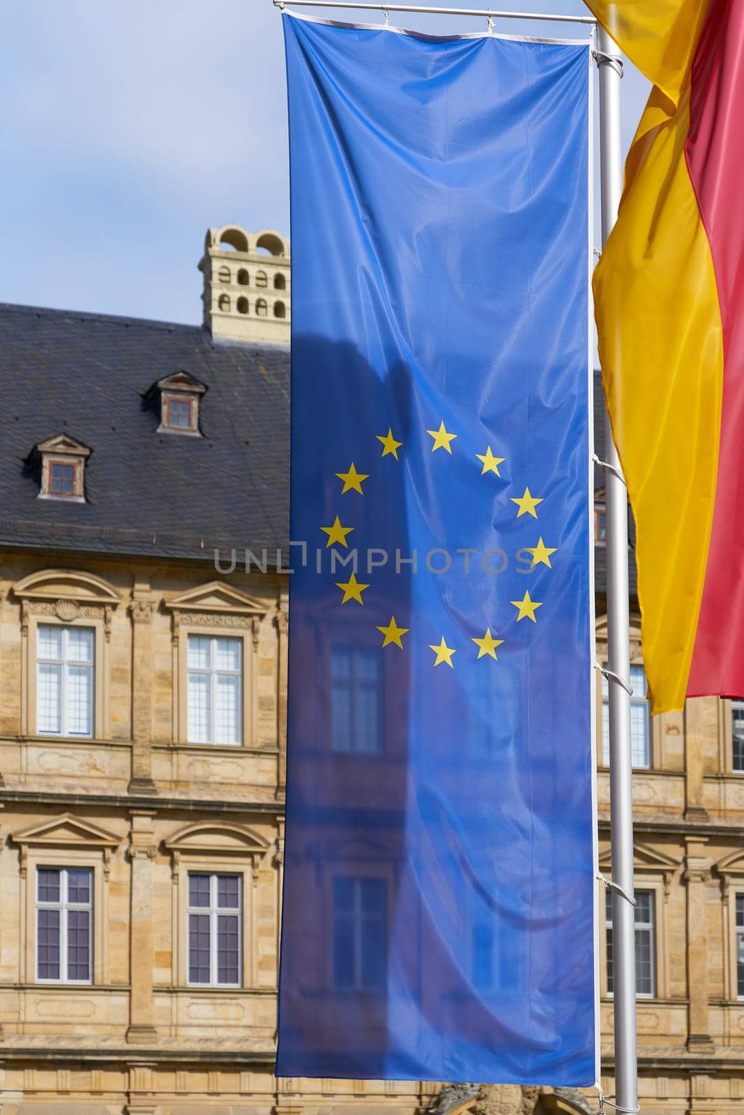 European flag in front of the new residence on Domplatz in Bamberg, Germany