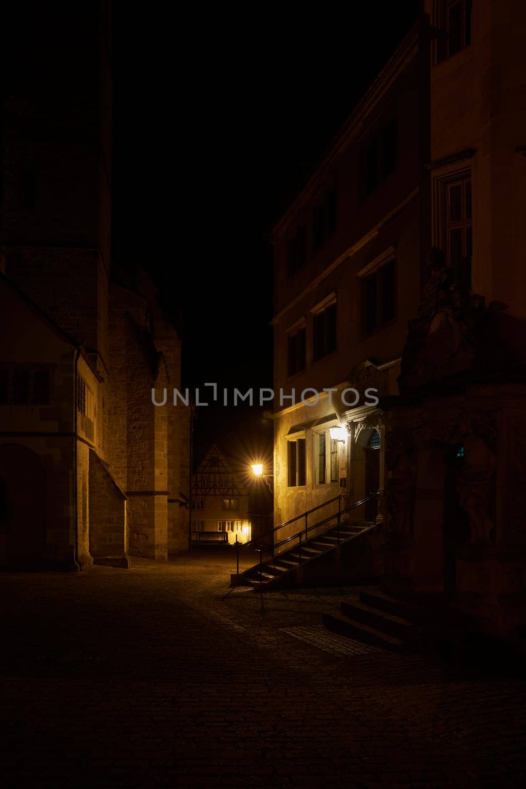 Night scene at St. Jacob's Church, St-Jakobs-Kirche on the church square, Kirchplatz in Rothenburg ob der Tauber in Germany