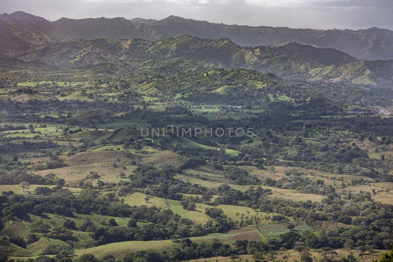 Scenic landscape showcasing the verdant hills and valleys of montana redonda in the dominican republic