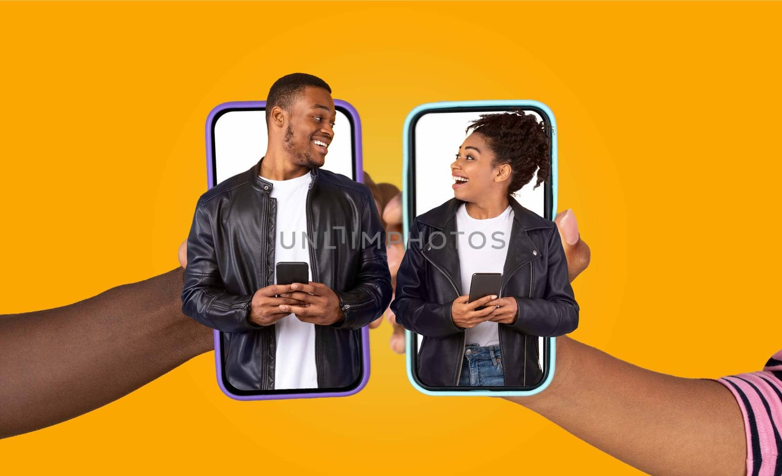 African American married couple shares a joyful moment while chatting on their smartphones. They engage with each other using a fun application, showing love and affection in their daily lifestyle.