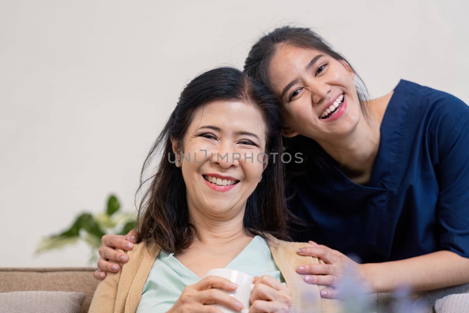 A heartwarming scene capturing the bond between a mother and daughter enjoying quality time together at home.
