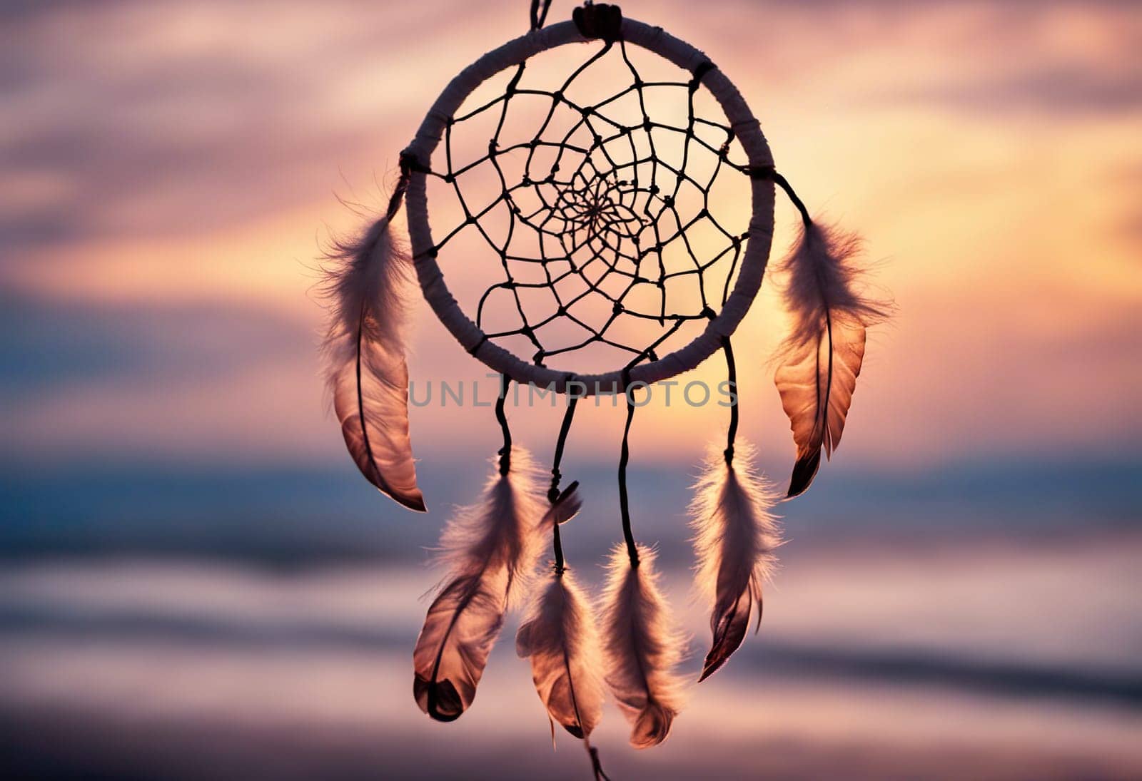 Dreamcatcher sunset sky, boho chic, ethnic amulet symbol Indigenous Peoples Day and Native Americans Day