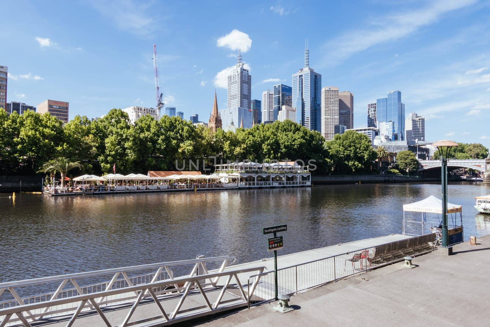 MELBOURNE, AUSTRALIA - JANUARY 08, 2025: Views towards Melbourne CBD and Princes Bridge along the Yarra River from Southbank in Melbourne, Victoria, Australia