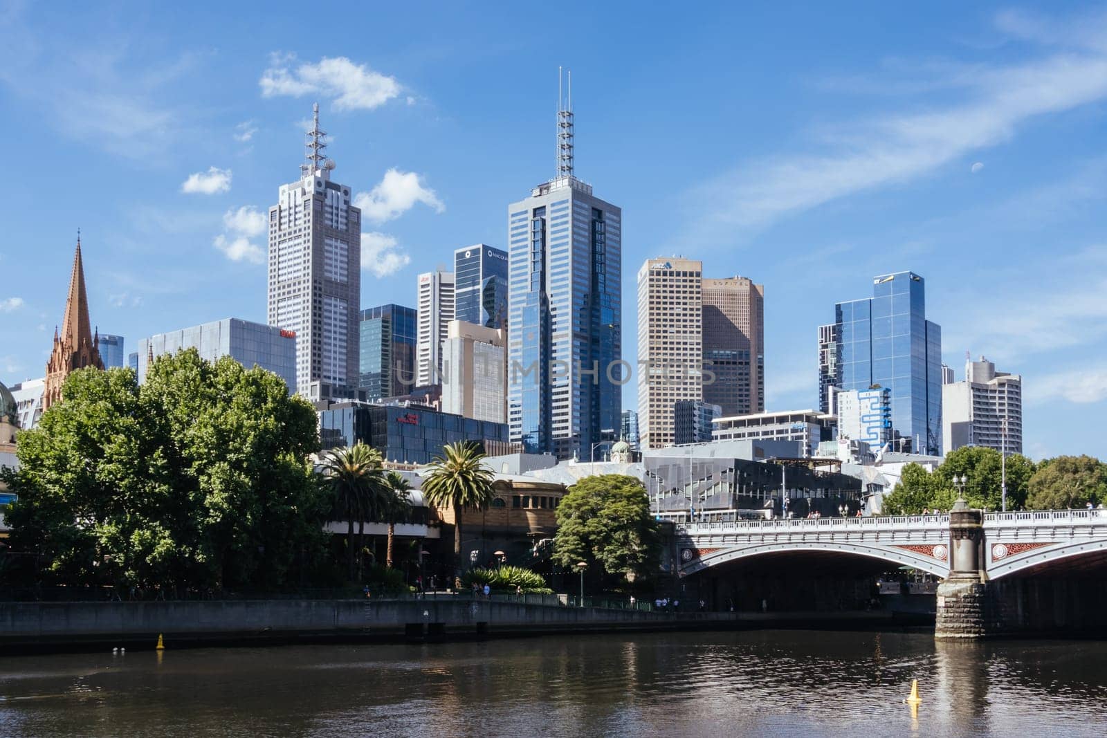 MELBOURNE, AUSTRALIA - JANUARY 08, 2025: Views towards Melbourne CBD and Princes Bridge along the Yarra River from Southbank in Melbourne, Victoria, Australia