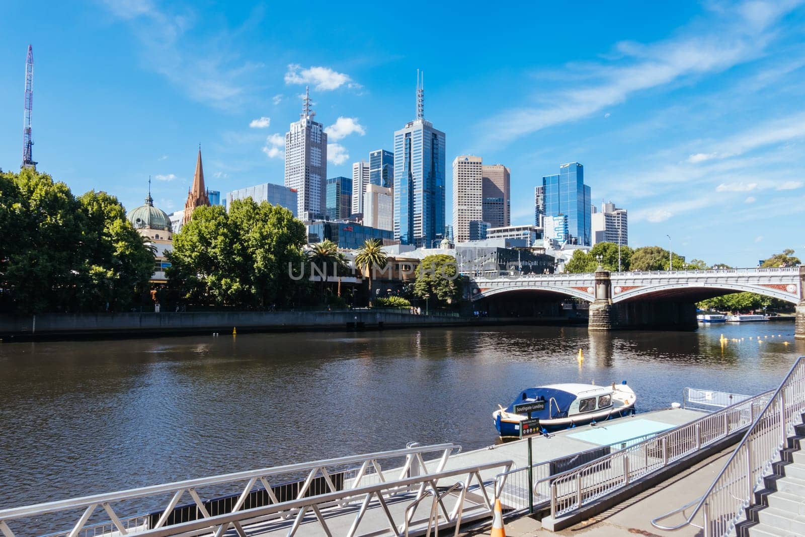 MELBOURNE, AUSTRALIA - JANUARY 08, 2025: Views towards Melbourne CBD and Princes Bridge along the Yarra River from Southbank in Melbourne, Victoria, Australia