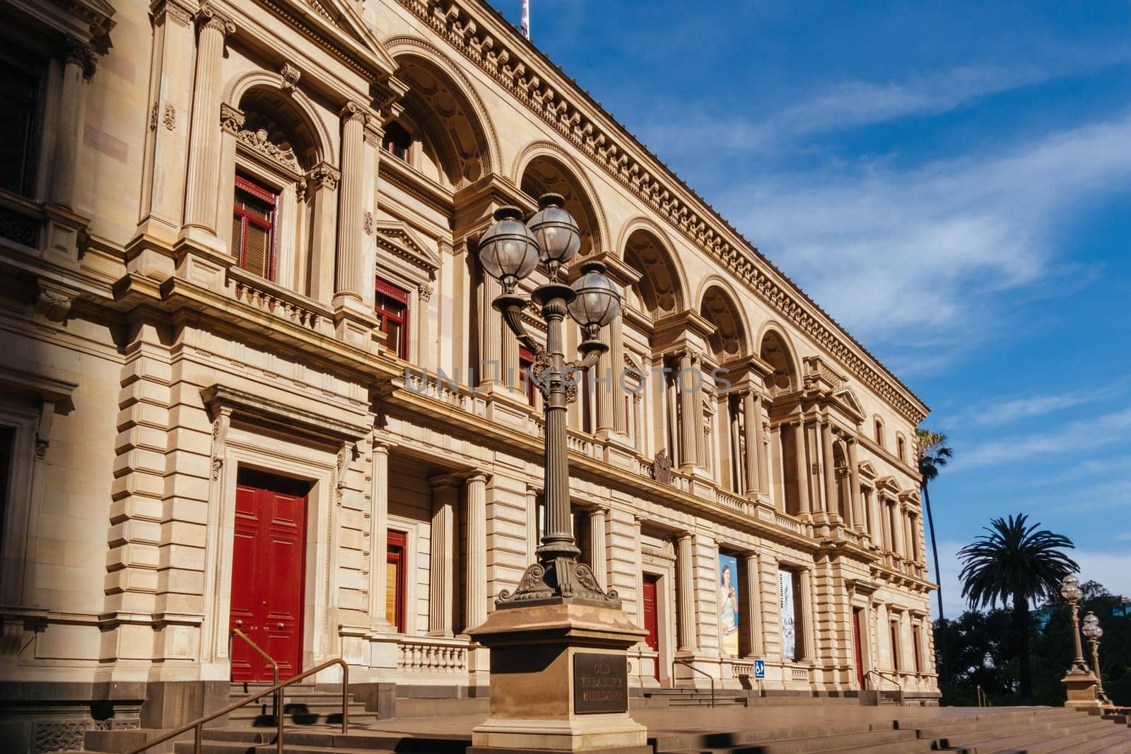 MELBOURNE, AUSTRALIA - JANUARY 8 2025: Old Treasury Building on a hot summer's afternoon in Melbourne CBD, Victoria, Australia