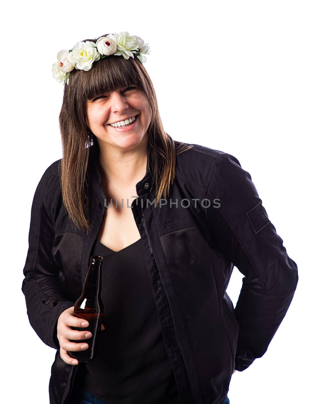 Forty something woman wearing a motocycle jacket,  flower crown and holding a beer
