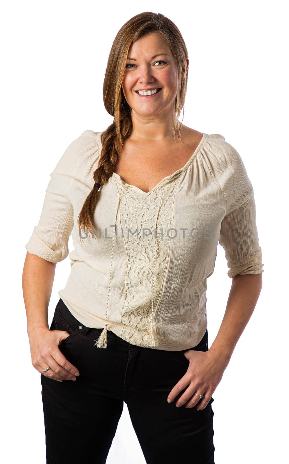 Portrait of a forty something woman, wearing casual clothes, isolated against a white background