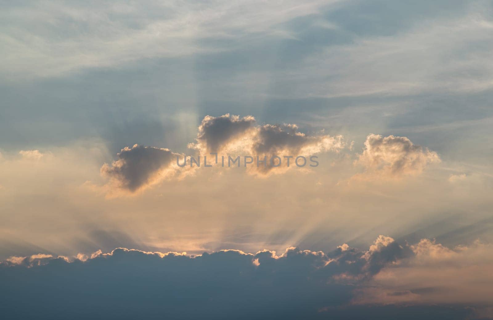 Colorful dramatic sky with cloud before sunset. Amazing clouds like a heaven for background wallpaper and texture, Concept idea of ​​Imaginative clouds nature, use it as your Poster and Space for text, Selective focus.