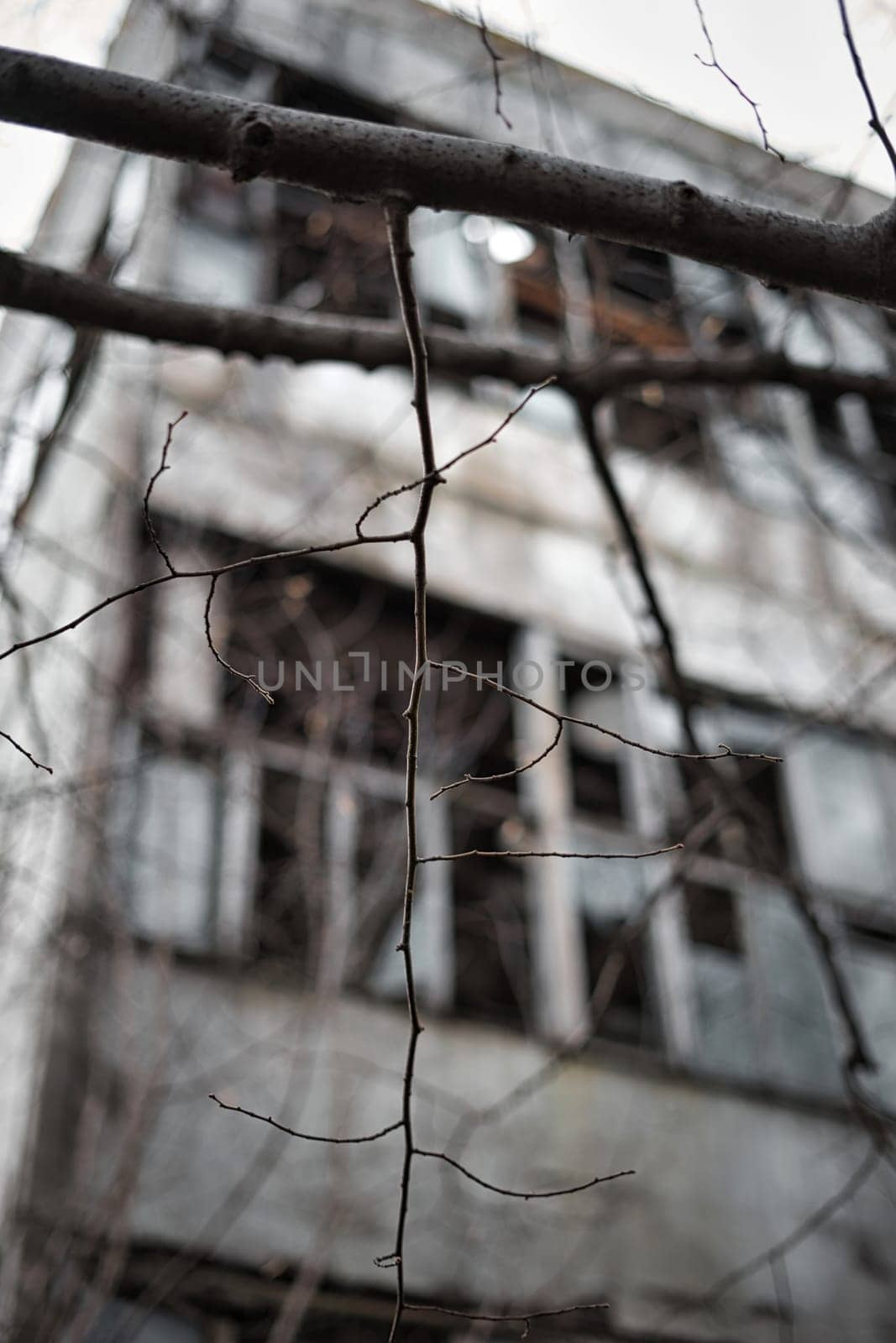 old window in an ancient brick wall in an abandoned farm barn. High quality photo