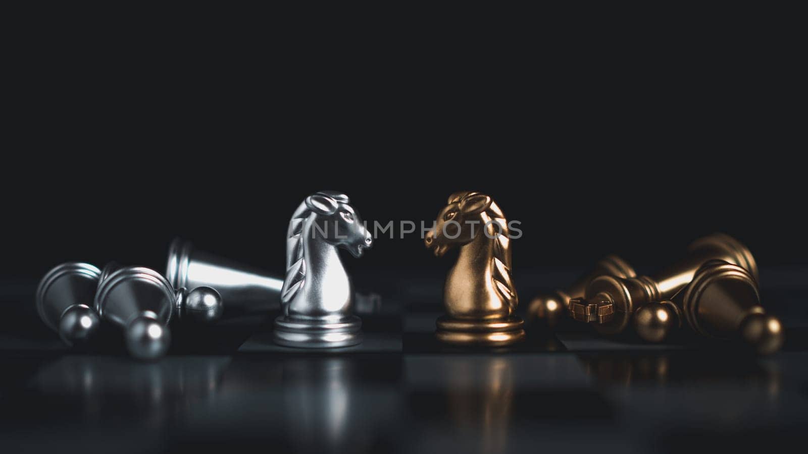 Gold and silver chess pieces in chess board game for business comparison. Leadership concepts, human resource management concepts, business administration concepts. by Unimages2527