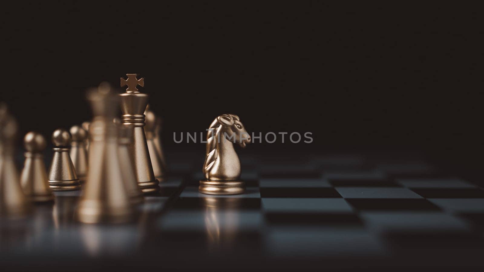 Gold and silver chess pieces in chess board game for business comparison. Leadership concepts, human resource management concepts.