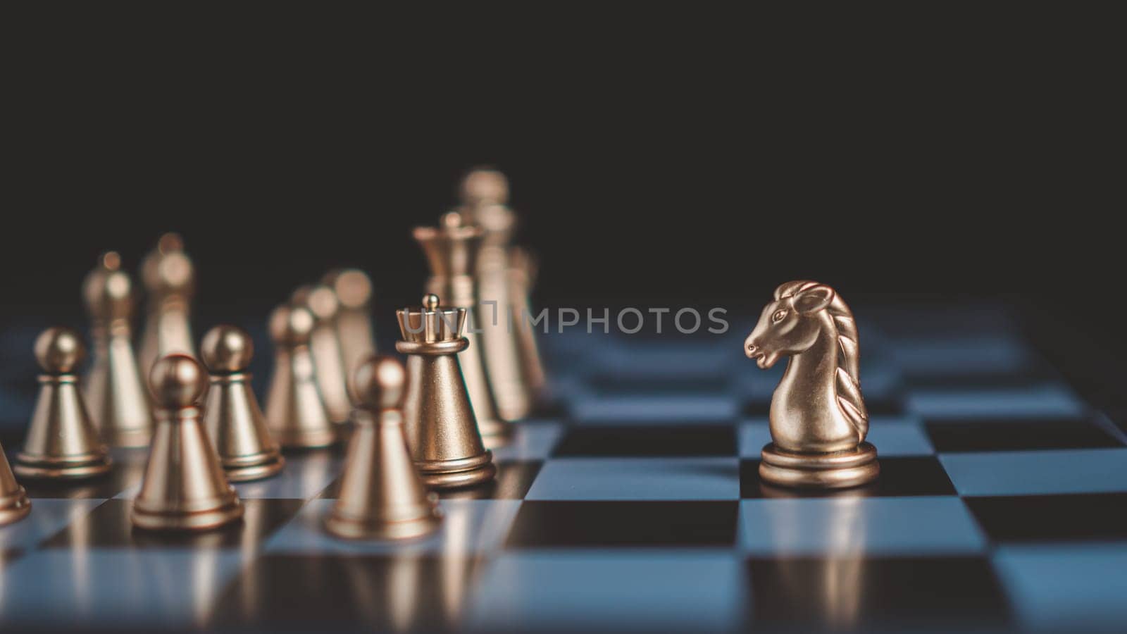 Gold and silver chess pieces in chess board game for business comparison. Leadership concepts, human resource management concepts.