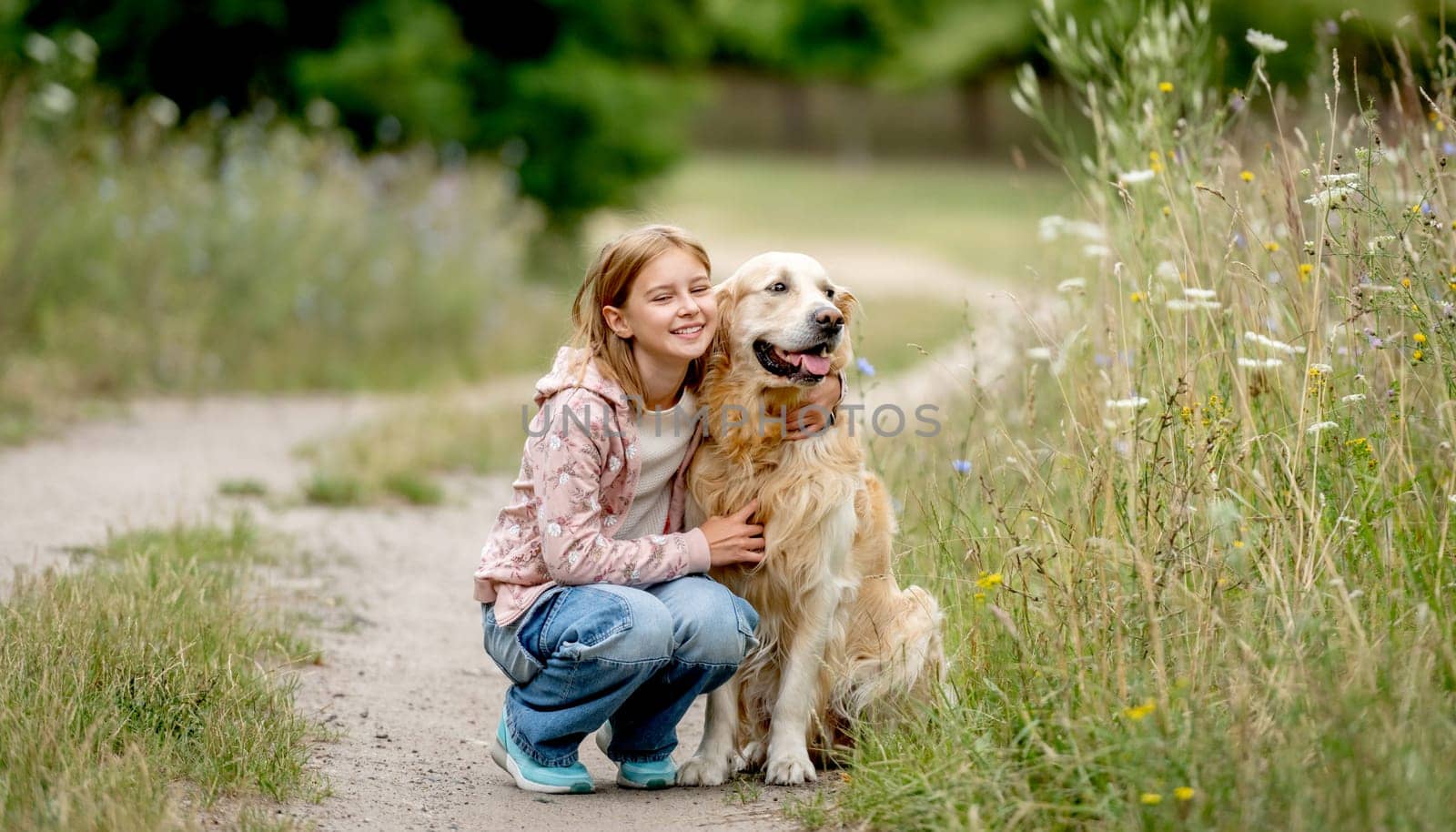 Girl with golden retriever dog at nature by tan4ikk1