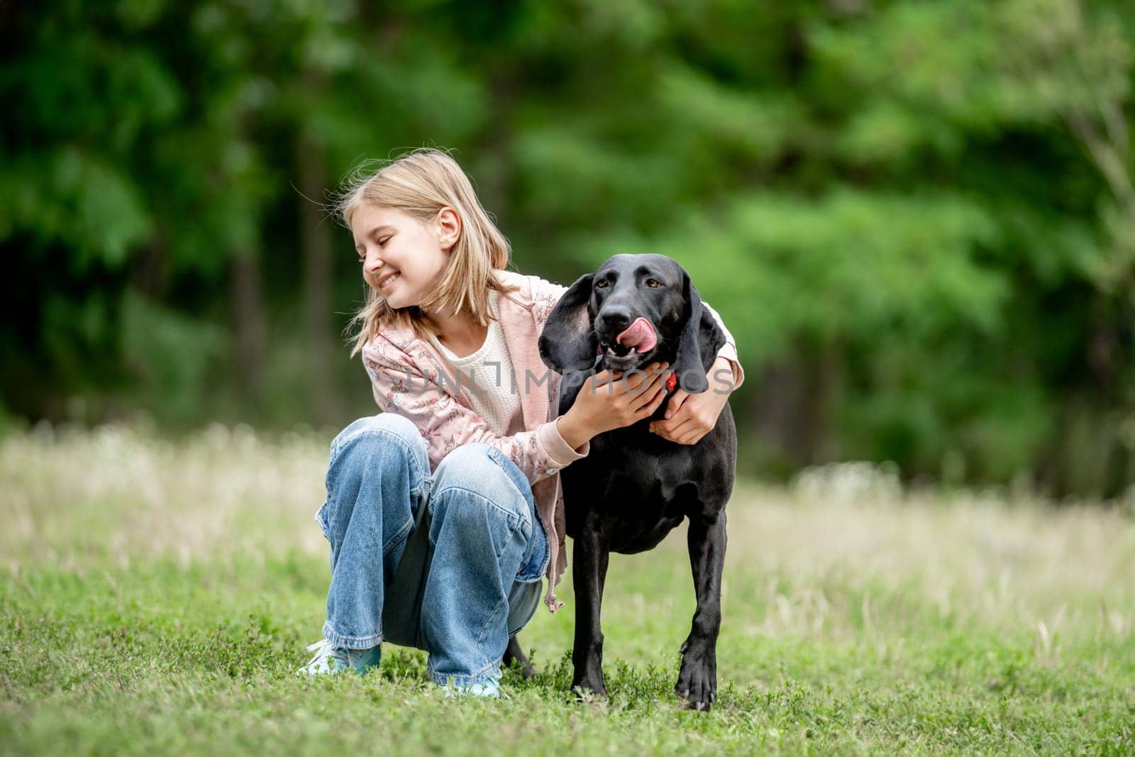 Girl with golden retriever dog at nature by tan4ikk1