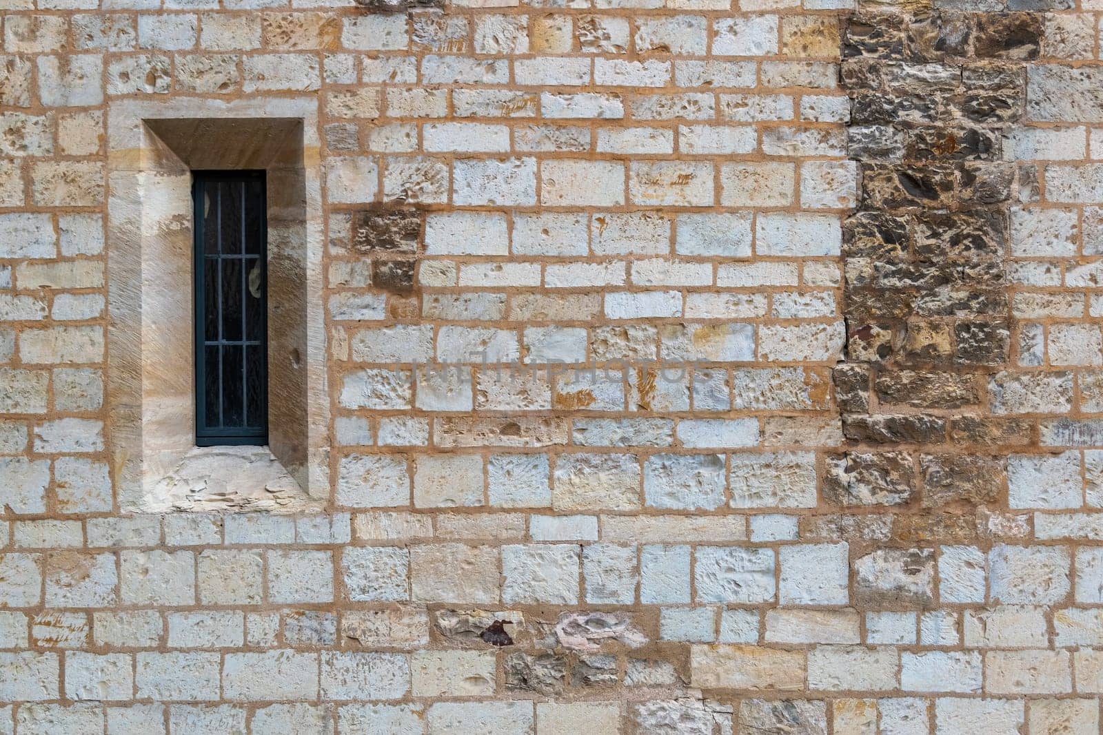 A window in the wall of the Convent of St. Agnes of Bohemia in Prague As a texture, background, background, for further graphic work