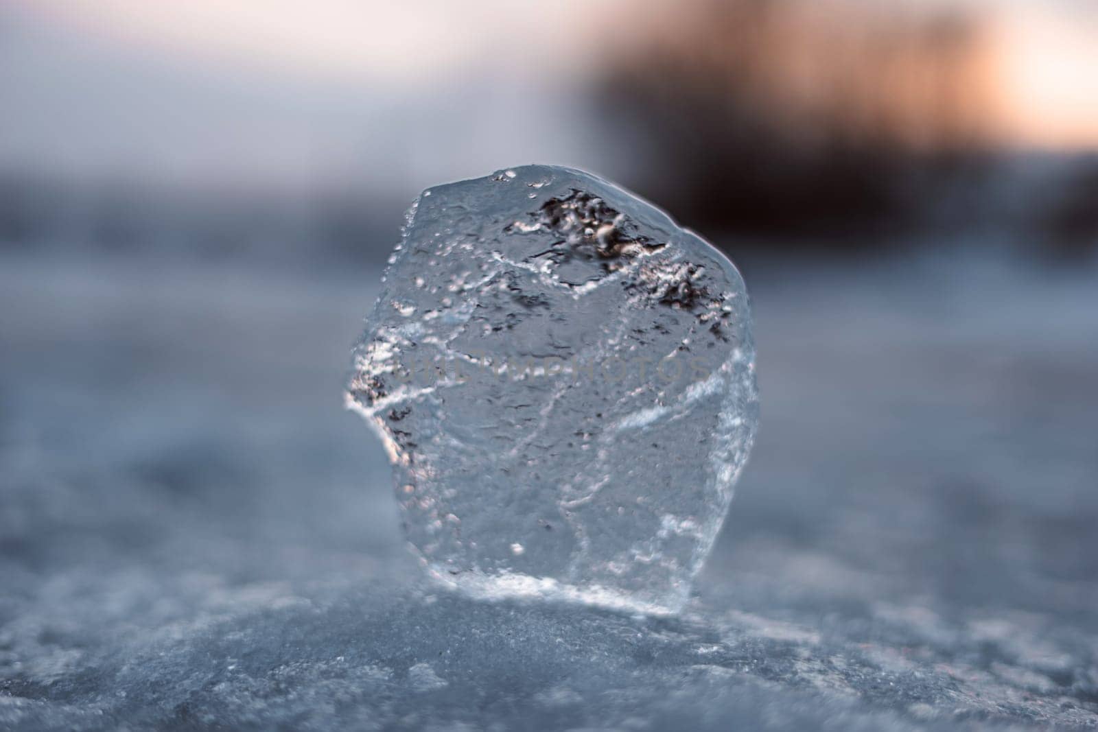 The ice of the frozen river is scattered into large and small fragments. High quality photo