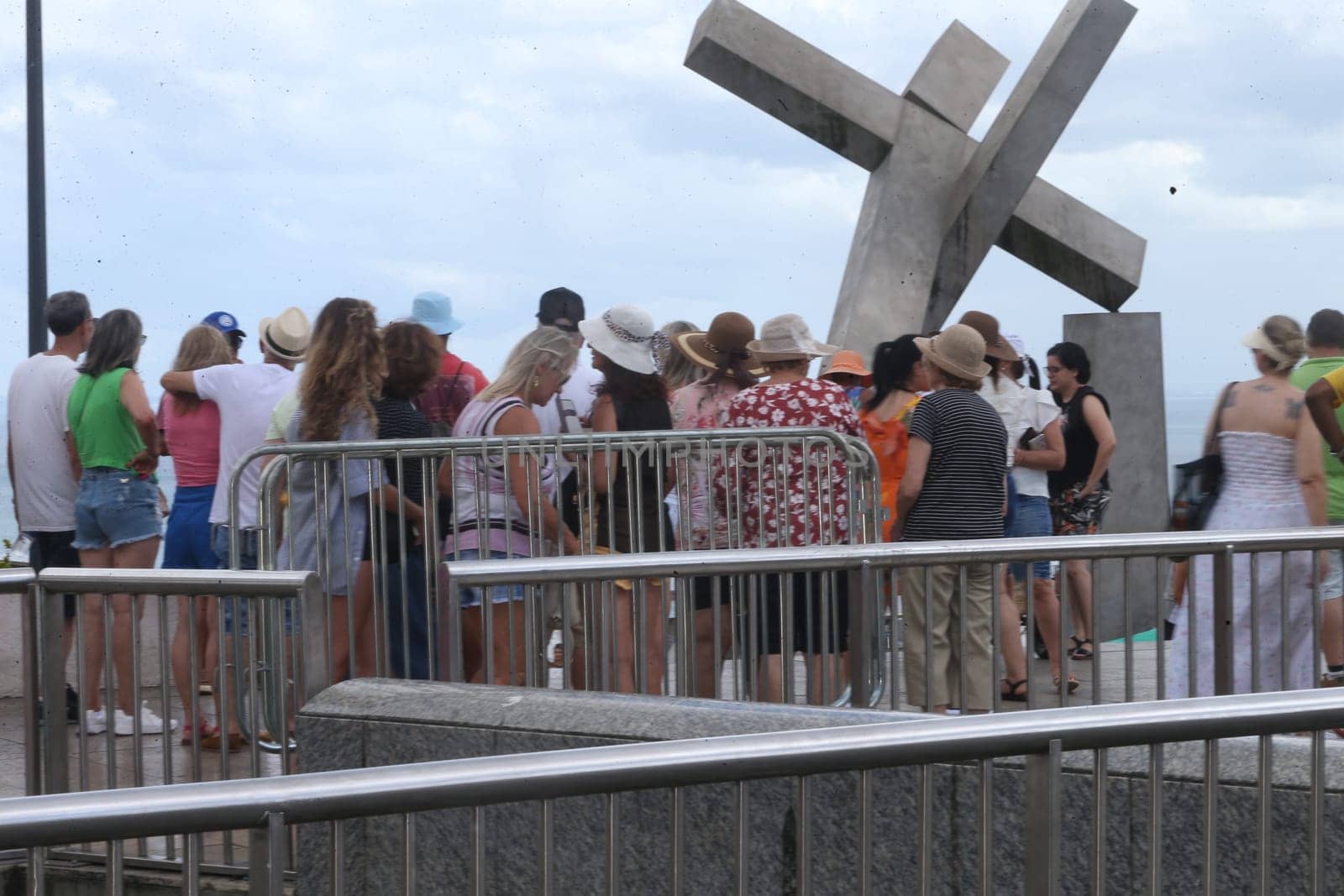 salvador, bahia, brazil - january 2, 2023: Tourists visit the Cruz Caida monument in Praça da Se, historic center of Salvador.