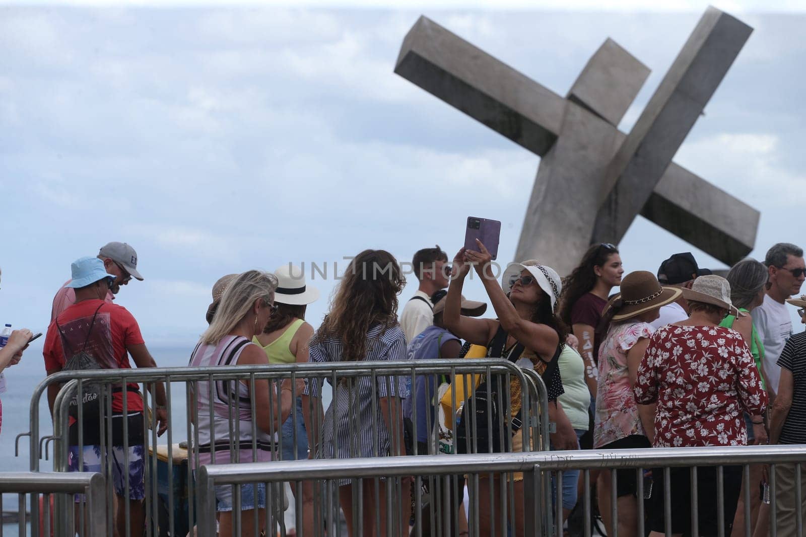 salvador, bahia, brazil - january 2, 2023: Tourists visit the Cruz Caida monument in Praça da Se, historic center of Salvador.