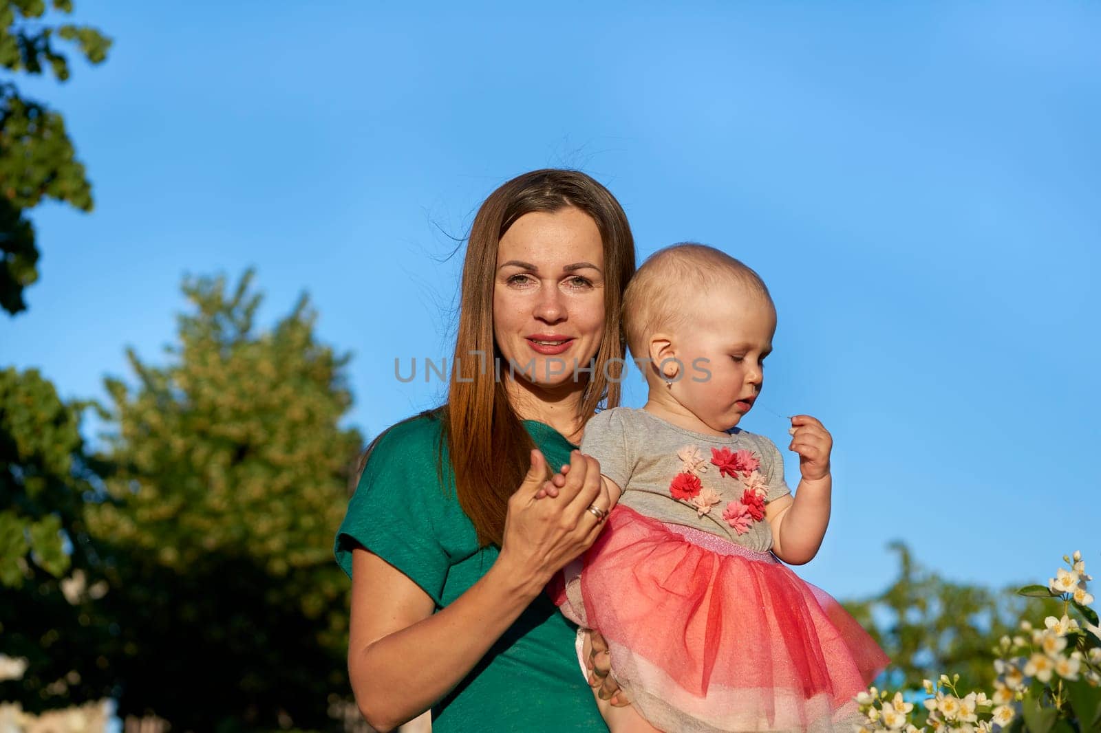 a girl or woman in relation to either or both of her parents