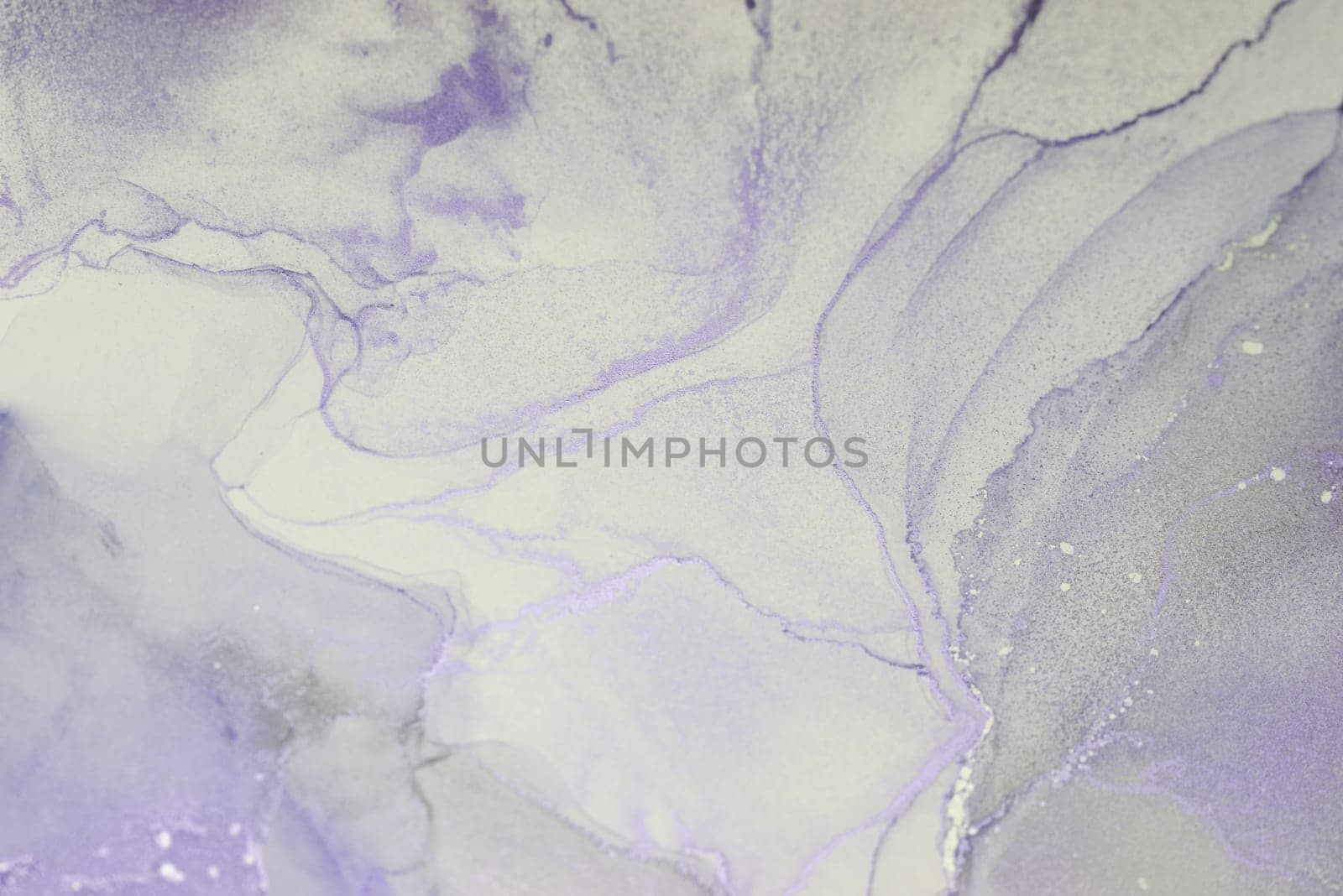 Swirls of soft purple and gray alcohol ink create a mesmerizing abstract composition. Fluid forms and delicate textures evoke a sense of calm and tranquility, inviting contemplation.