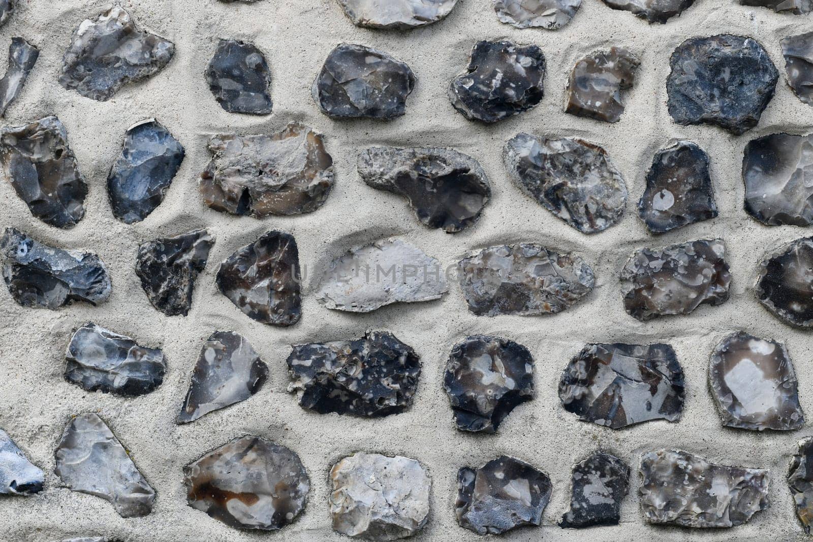 Flint stone wall. Building in Normandy France Alabaster Coast