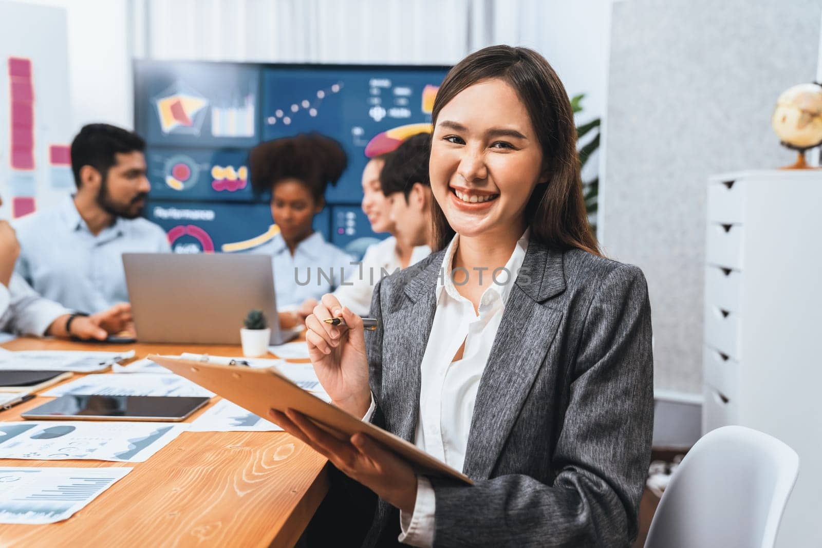 Portrait of happy young asian businesswoman with in office meeting. Concord by biancoblue