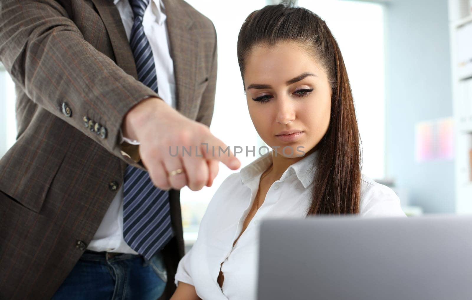 Beautiful brunette woman use laptop pc in office solve and discuss problem portrait. Fresh view review situation new angle look professional train white collar investment and finance boss concept