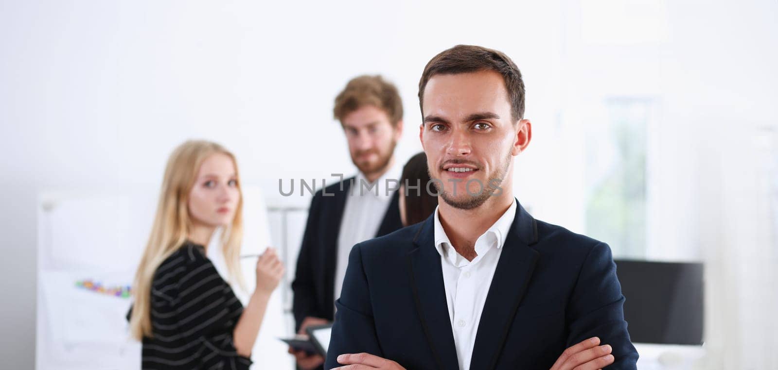 Handsome man in suit and tie look in camera by kuprevich