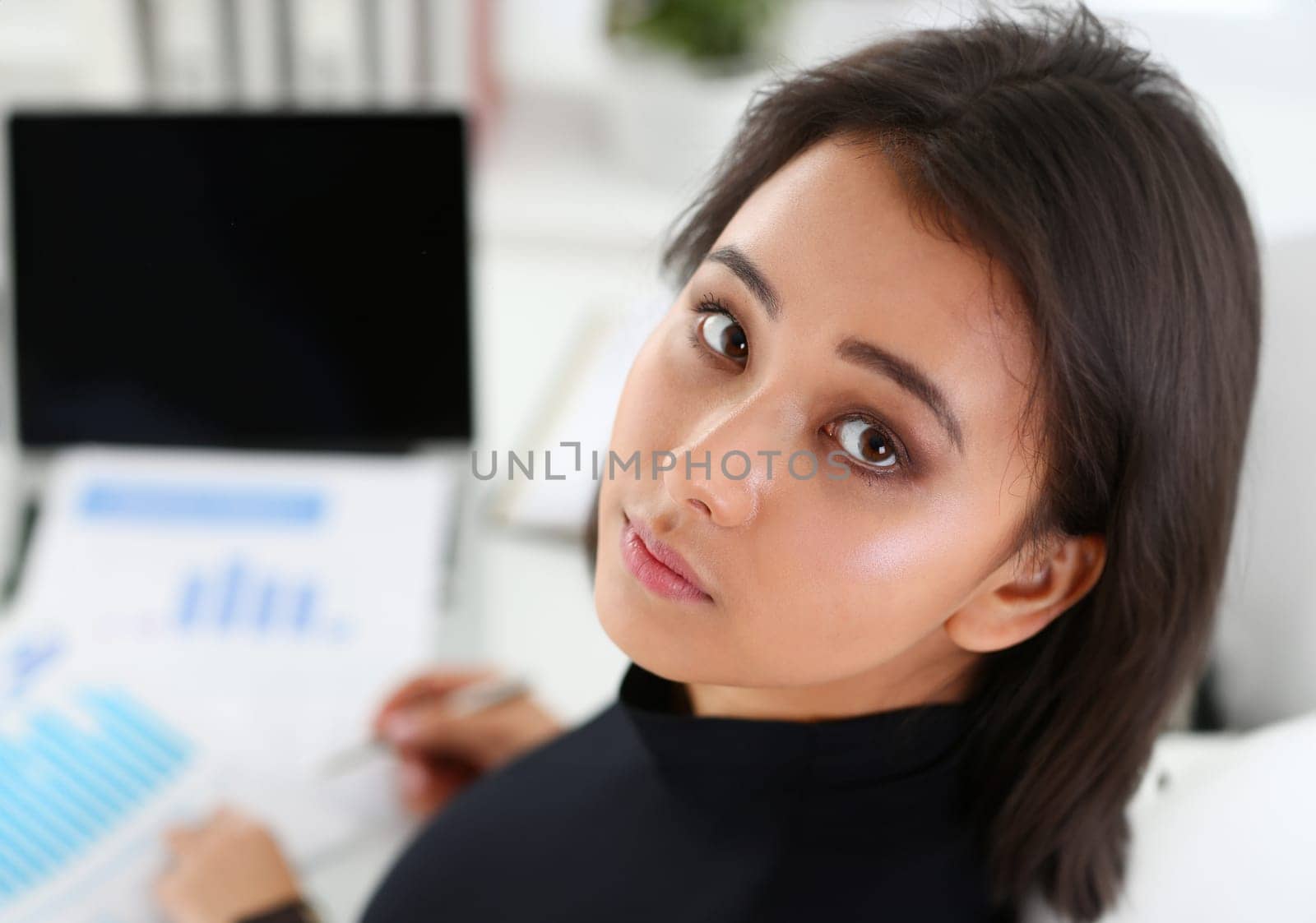 Beautiful smiling chinese businesswoman portrait at workplace look in camera. White collar worker at workspace exchange market job offer certified public accountant internal revenue officer concept