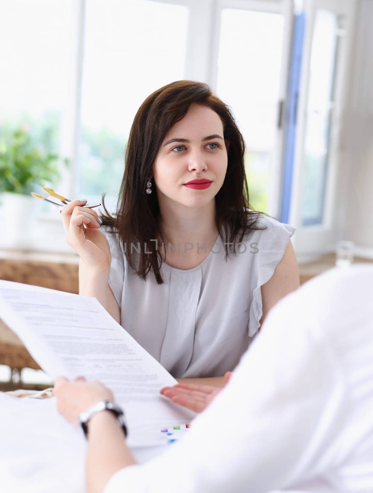 Beautiful smiling businesswoman portrait at workplace look in camera. White collar worker at workspace exchange market job offer irs certified public accountant internal revenue officer concept