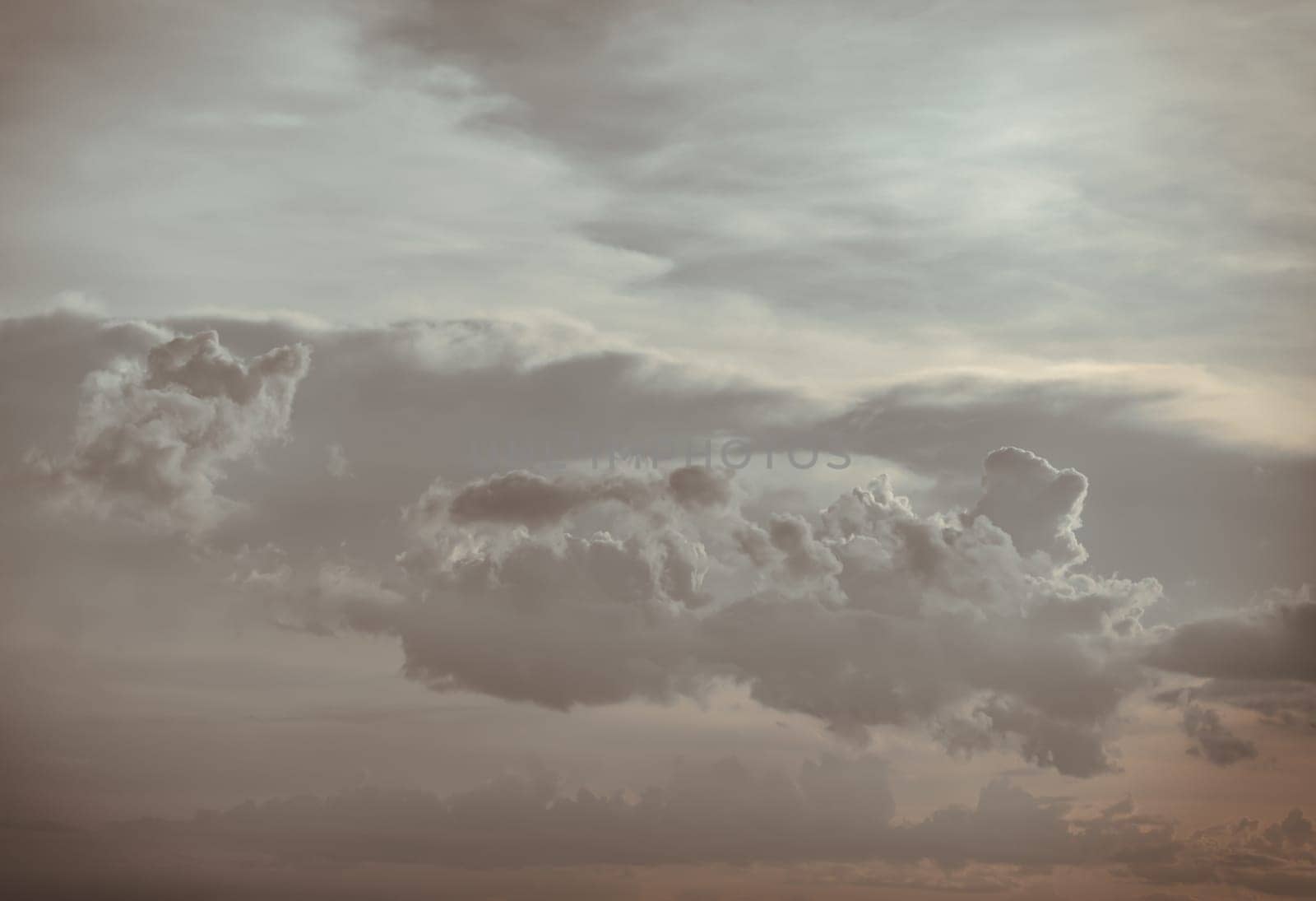 Dramatic clouds with blue sky background before sunset. The softness of the clouds and the brightness of the sky. Concept idea of Imaginative clouds and sky, Nature abstract composition, use it as your Wallpaper, Poster and Space for text, Selective focus.