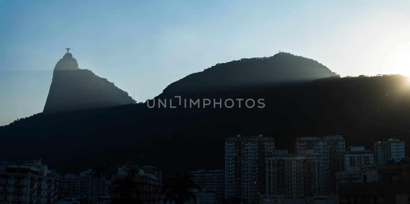 Scenic Sunset View with Christ the Redeemer and Mountains of Rio de Janeiro by FerradalFCG