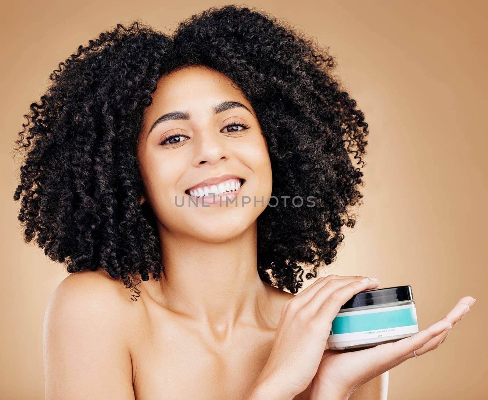 Woman, hair and container in portrait, beauty and product for wellness, cream for cosmetics on studio background. Advertising, treatment and haircare for growth and strong texture with gel or shampoo by YuriArcurs
