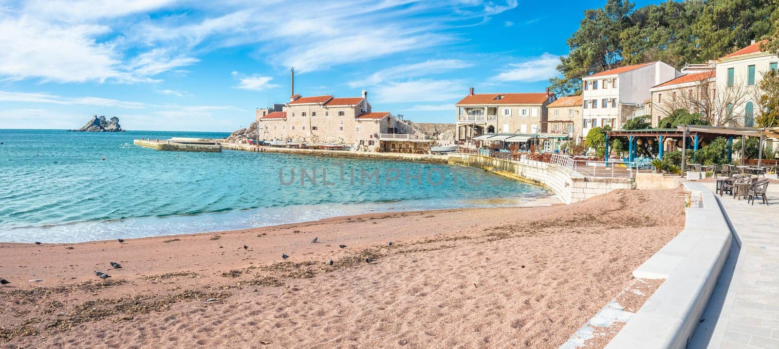 Town of Petrovac beach and coastline panoramic view, archipelago of Montenegro