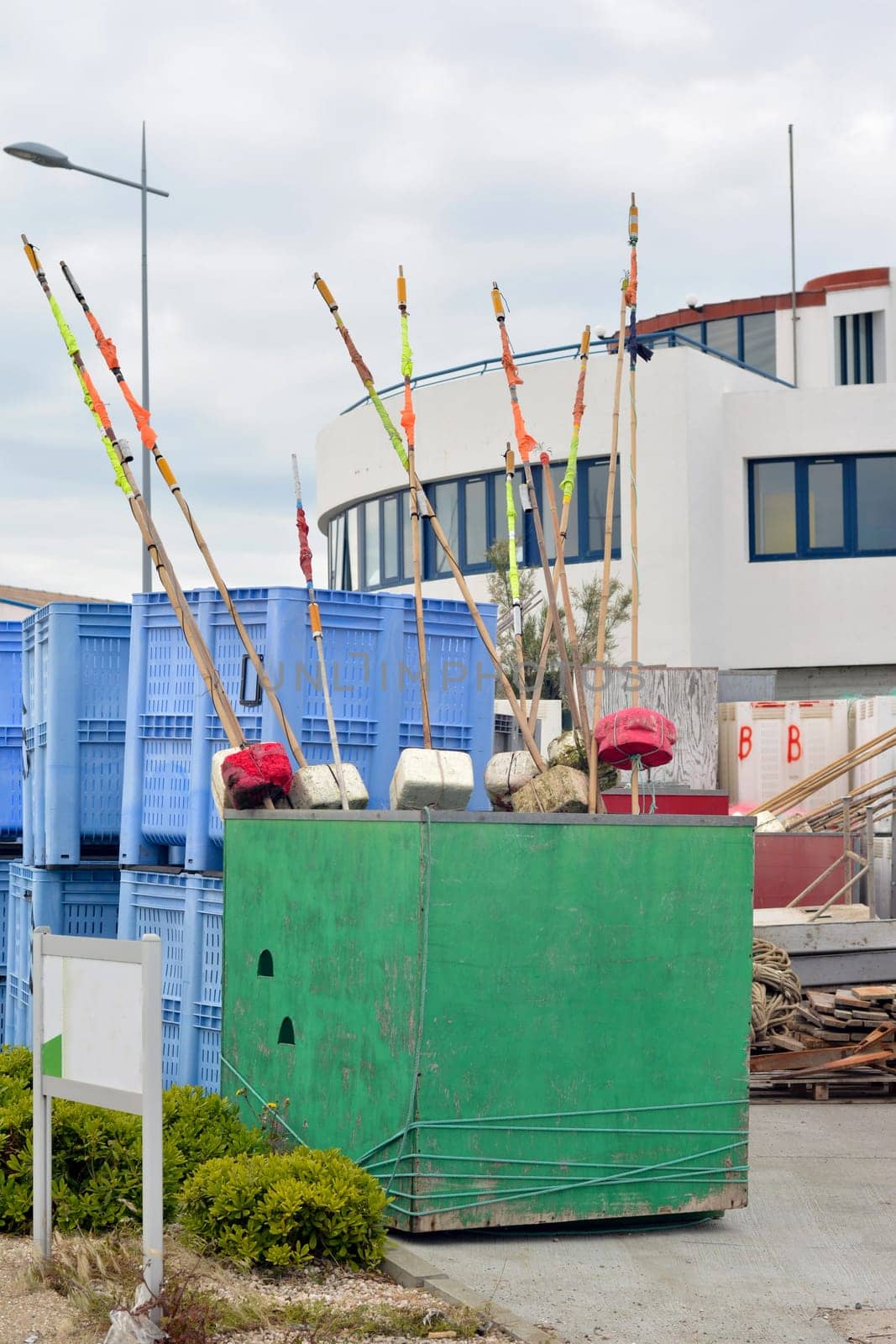 Fishing rods in a container in the port