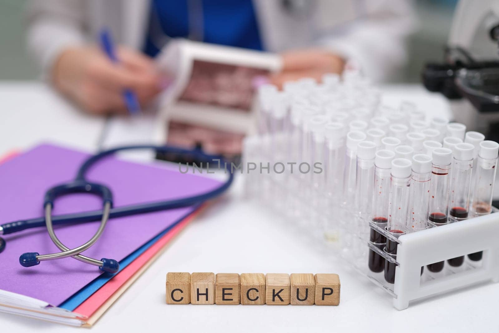 A dedicated workspace that features various laboratory equipment, medical supplies, and essential checkup items