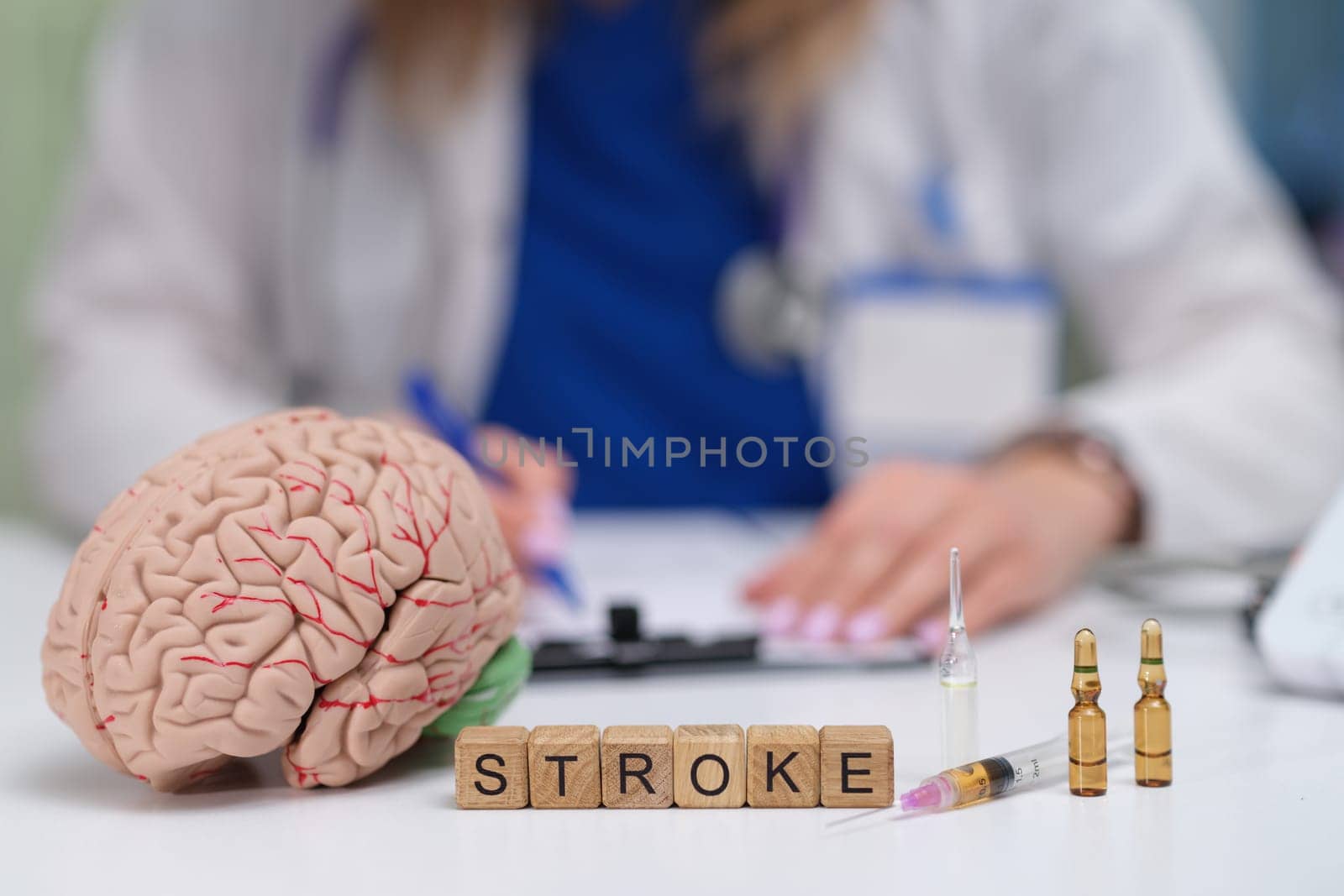 An insightful representation of stroke awareness showcasing a detailed brain model along with essential medical tools