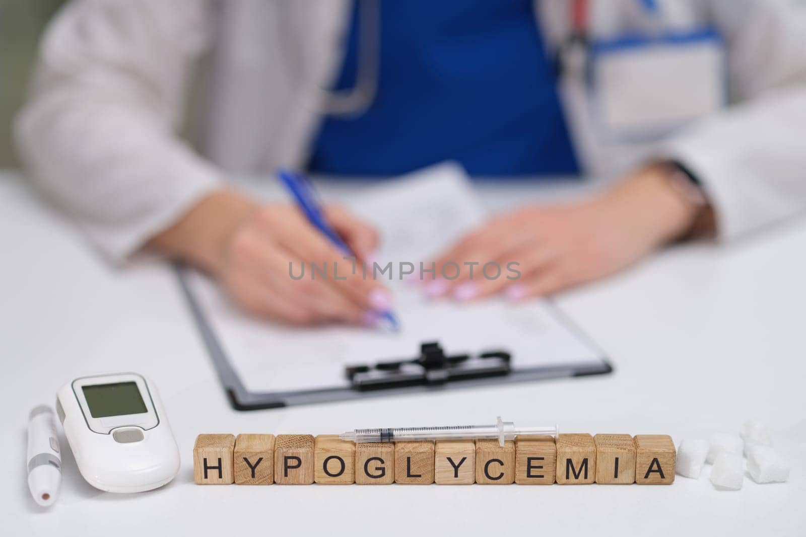 A qualified healthcare professional carefully notes important details about hypoglycemia monitoring and management
