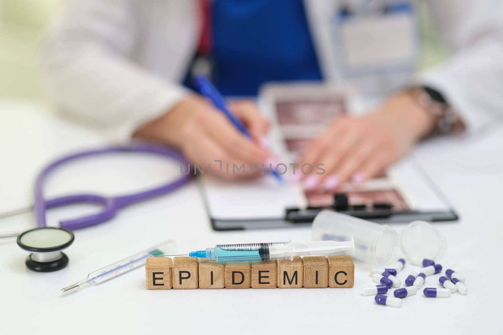 A healthcare professional documents responses to an epidemic using medical tools to ensure accuracy and efficiency