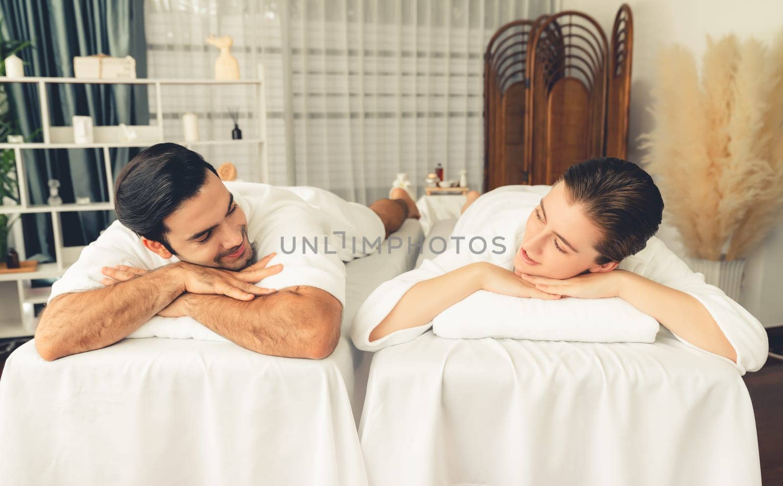 Caucasian couple customer enjoying relaxing anti-stress massage. Quiescent by biancoblue