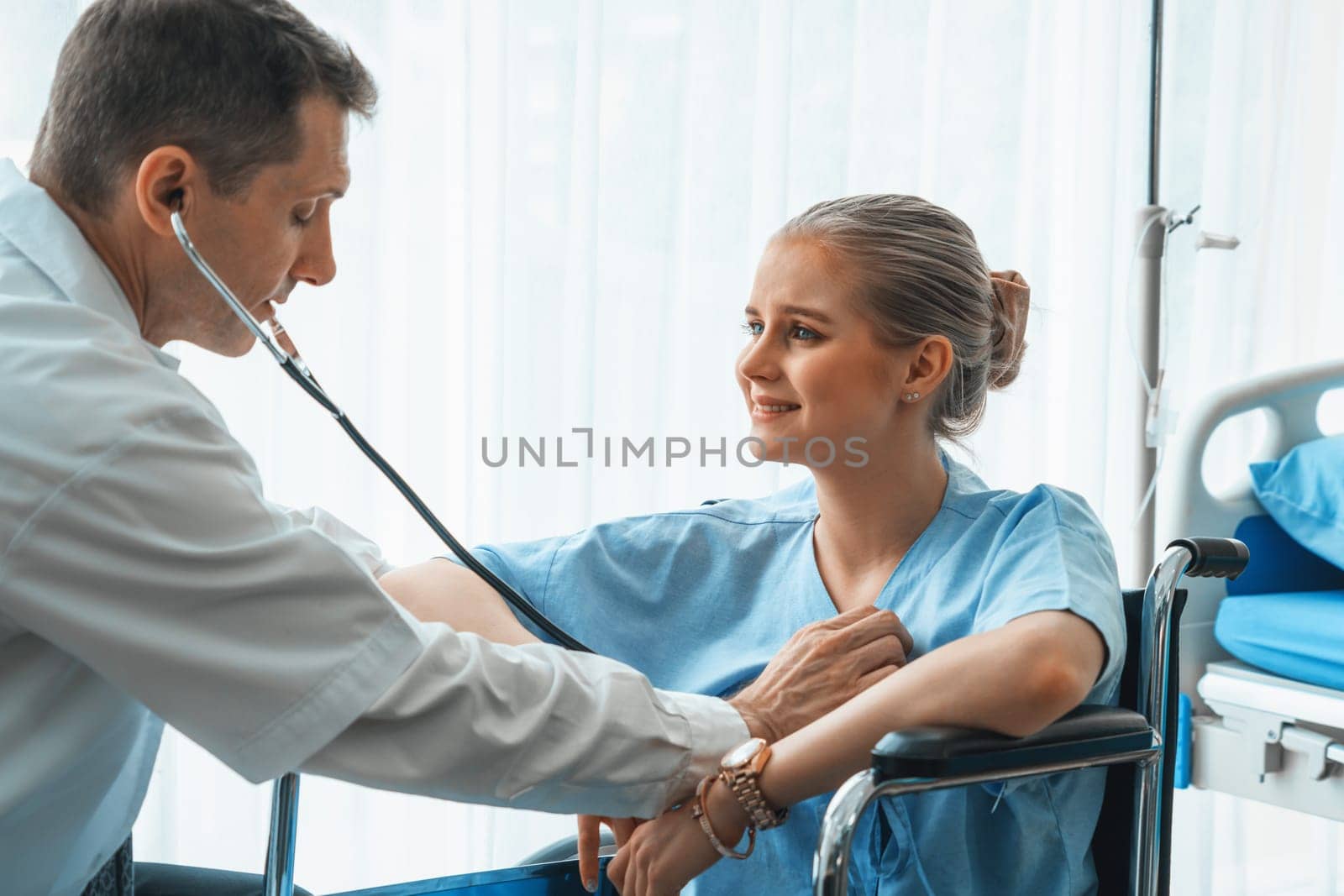 Doctor in professional uniform examining patient at hospital or medical clinic. Health care , medical and doctor staff service concept. Jivy