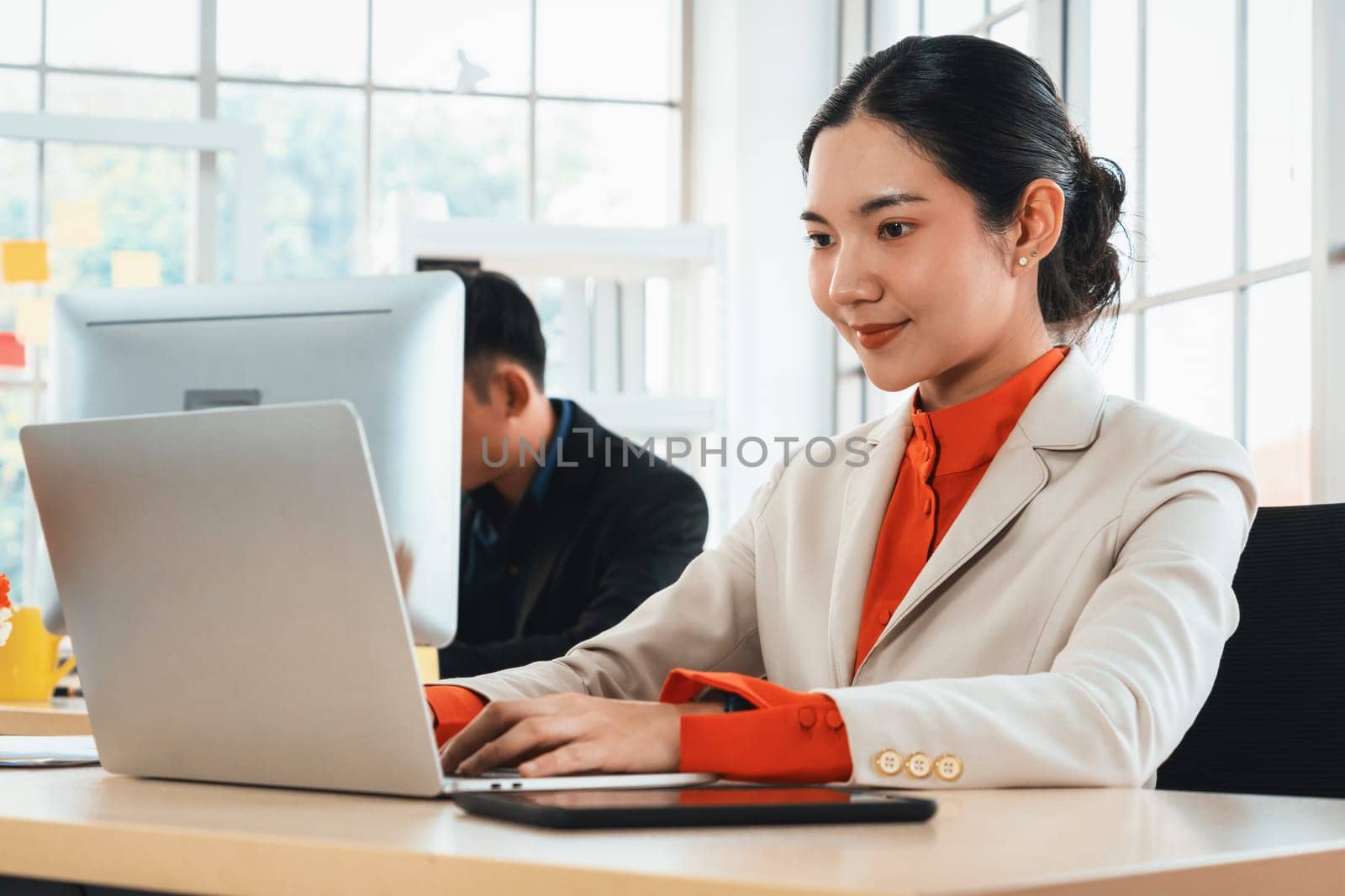 Business people working at table in modern office Jivy by biancoblue