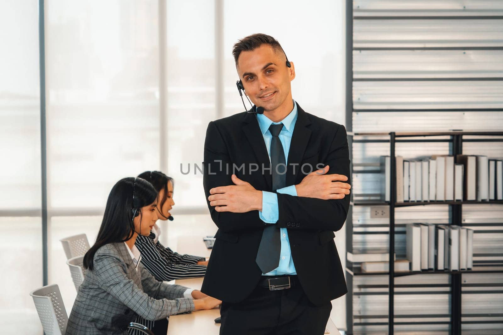 Business people wearing headset working in office Jivy by biancoblue