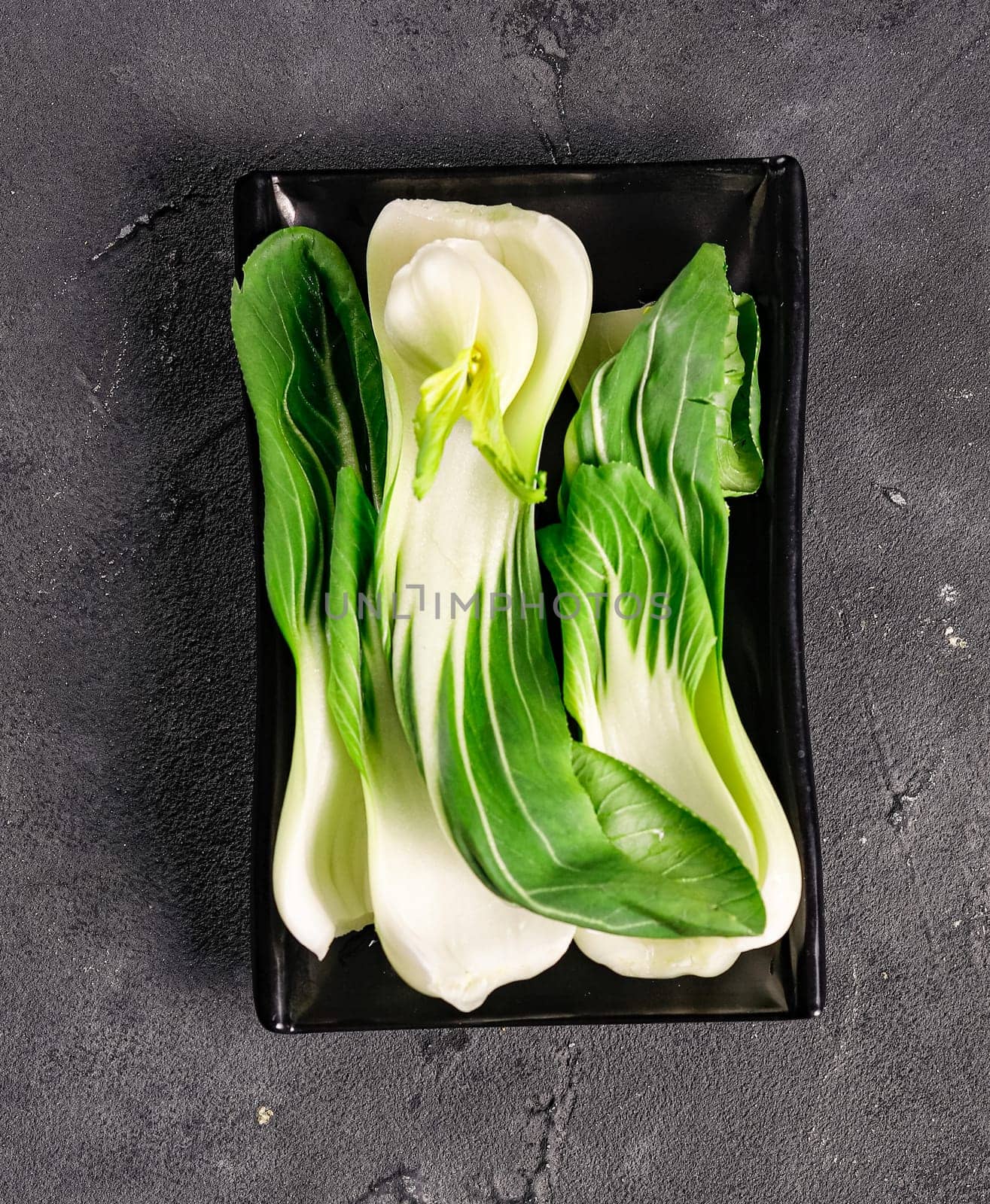 green and fresh pak choi. Garnish. View from above. Chinese cuisine, hotpot ingredient