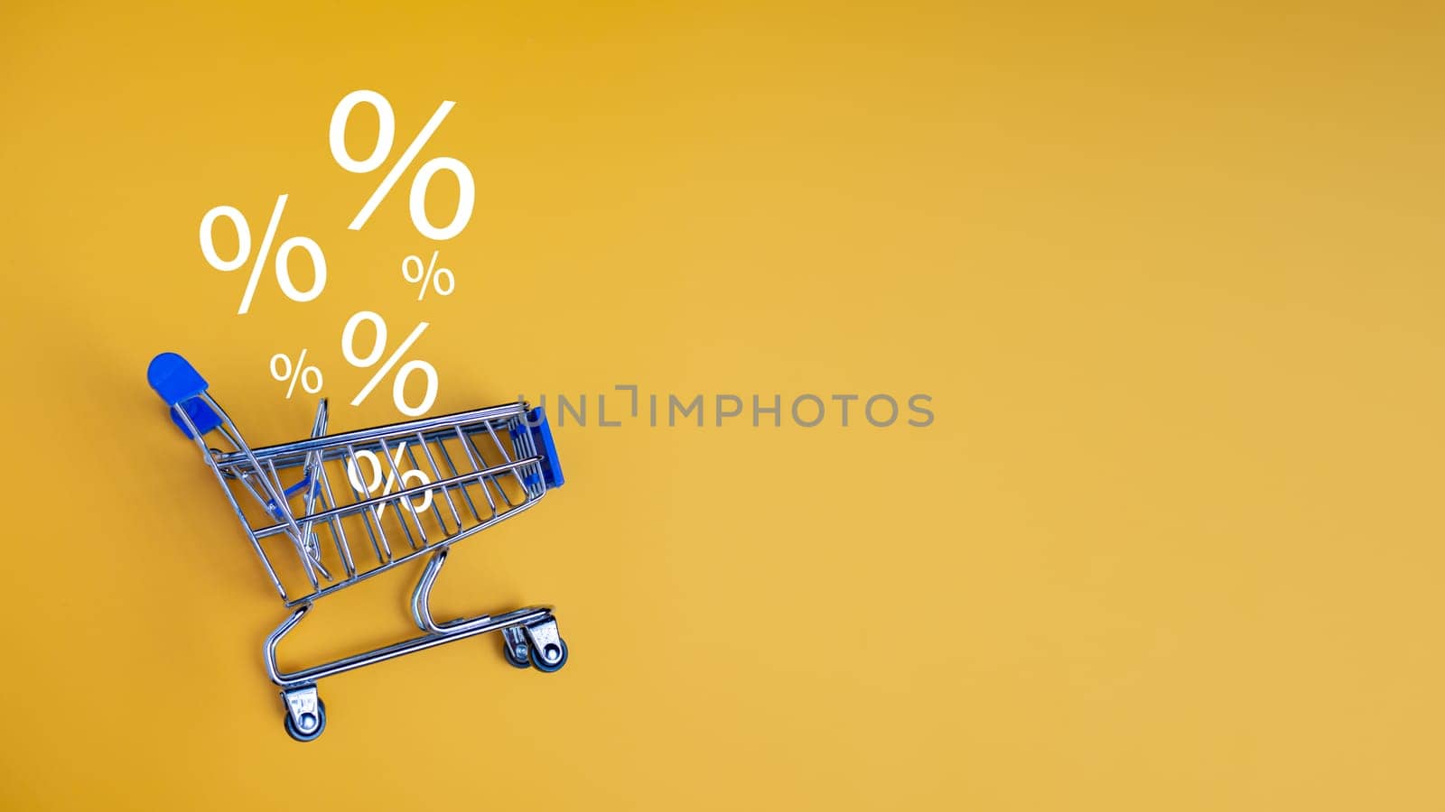 Sale percentage falling in shopping car on yellow background. Shopping online concept, Special price products, Specialand promotion.