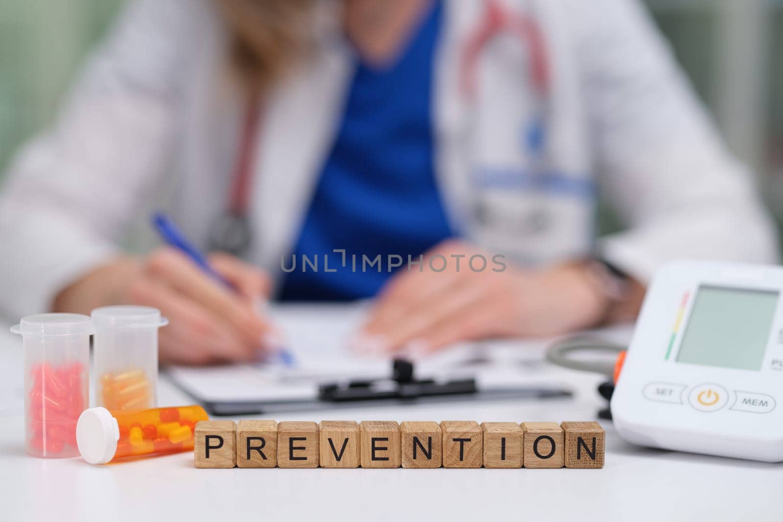 A healthcare professional stresses prevention with various medical tools, highlighting the word PREVENTION