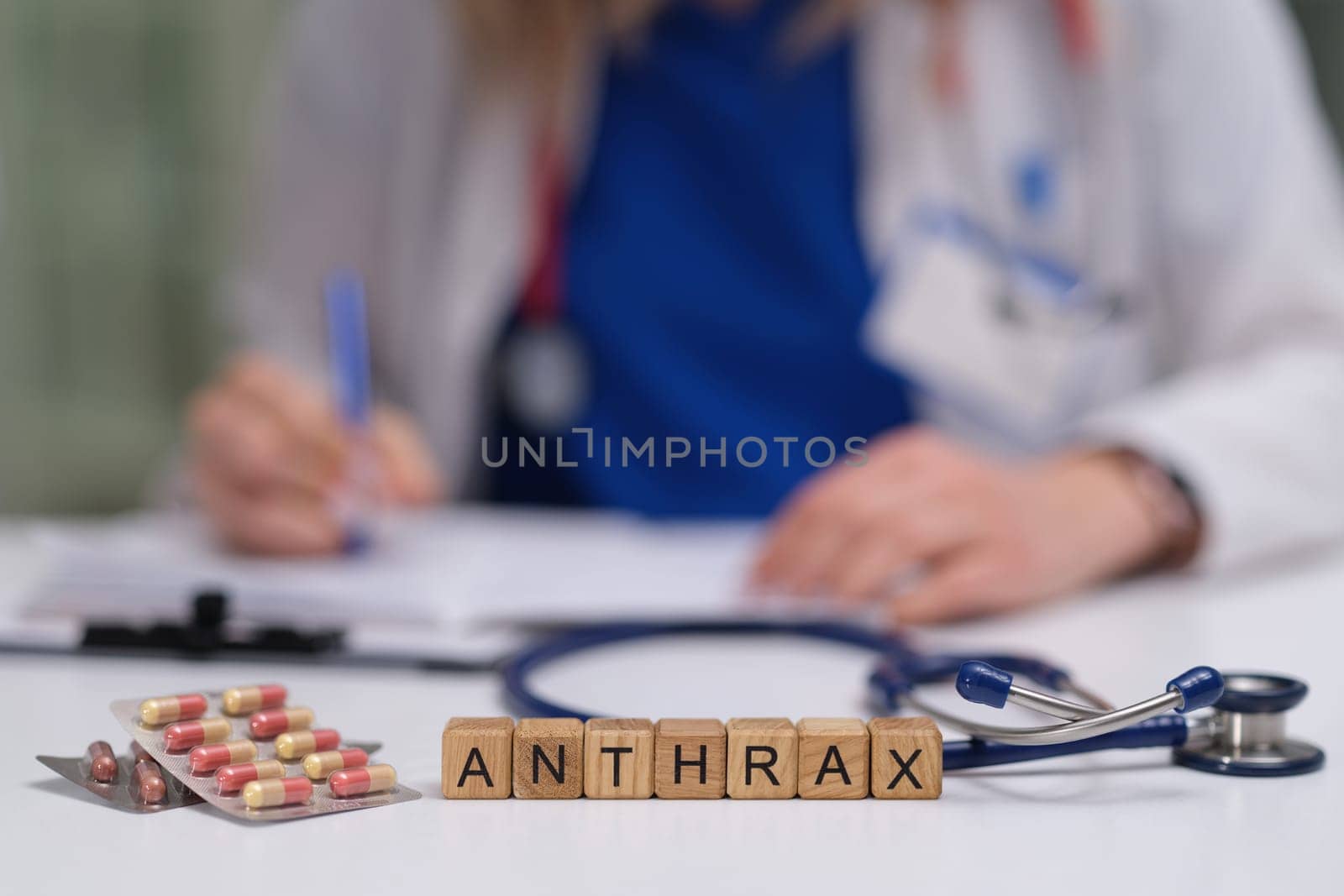 An image depicting the word 'ANTHRAX' with medical elements, highlighting its significance in health.